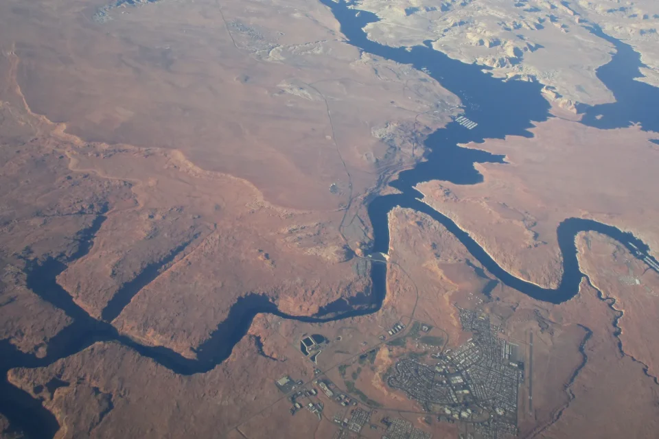 Aerial view connecting Page, Glen Canyon Dam, Colorado River, Wahweap, and Lake Powell